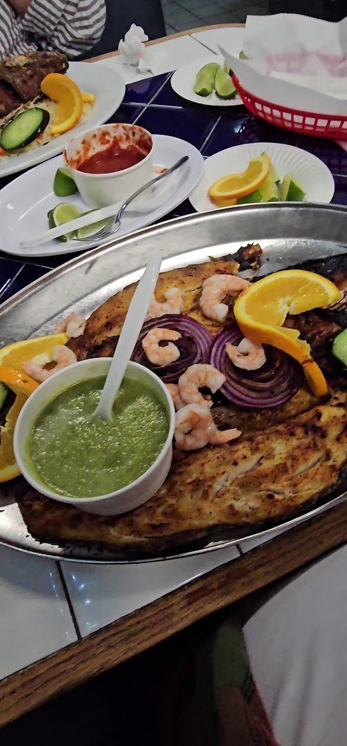 Fresh seafood served with chips and salsa